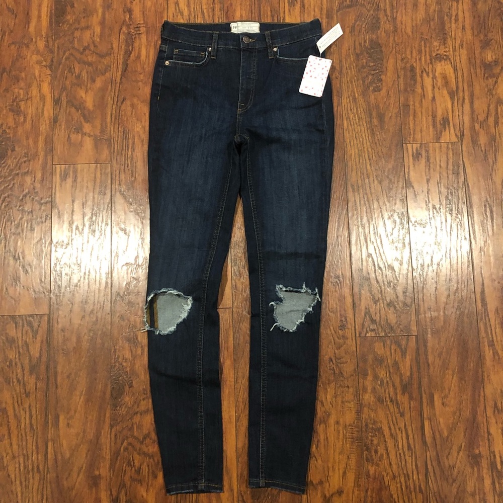 Free people darker wash jeans with distressed legs